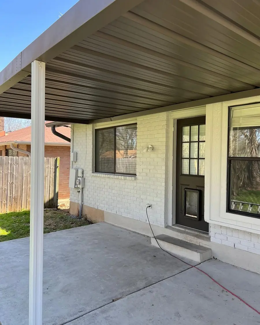 Covered patio after New Life Painting refreshed the exterior brick and trim
