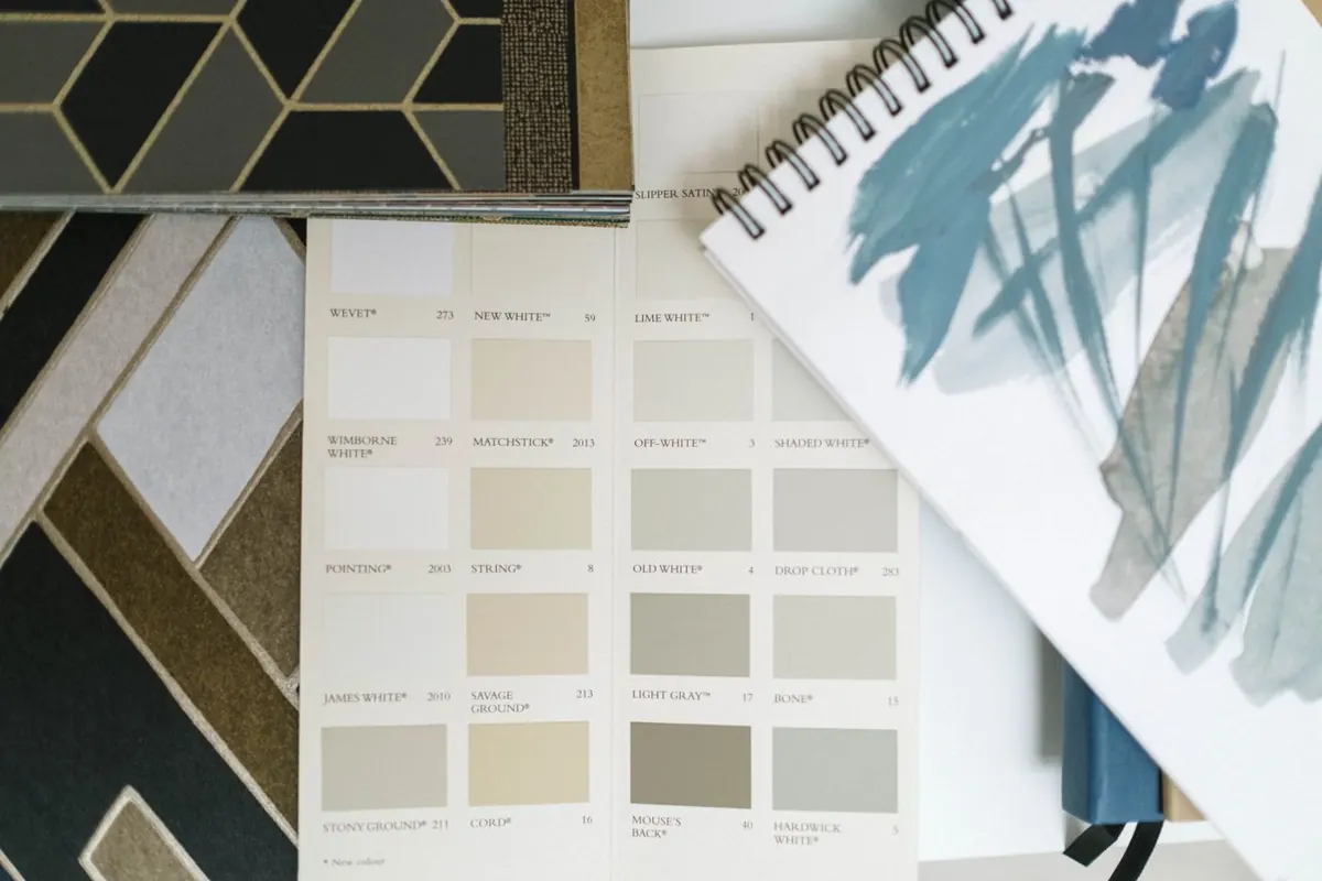 Interior design board with paint color samples and finish ideas