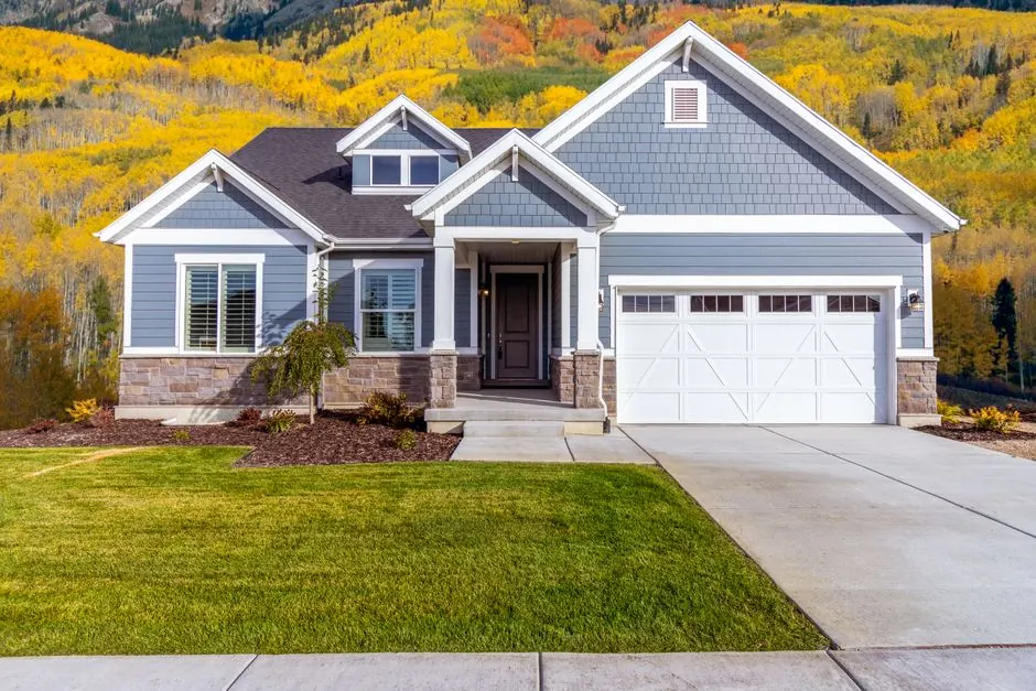 Freshly painted gray home exterior in bright outdoor light