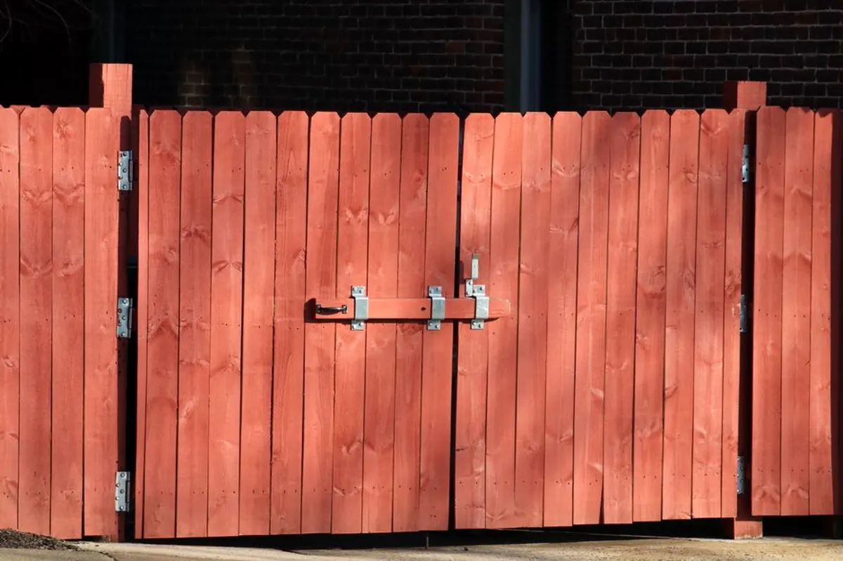 Wood privacy fence showing boards and finish condition