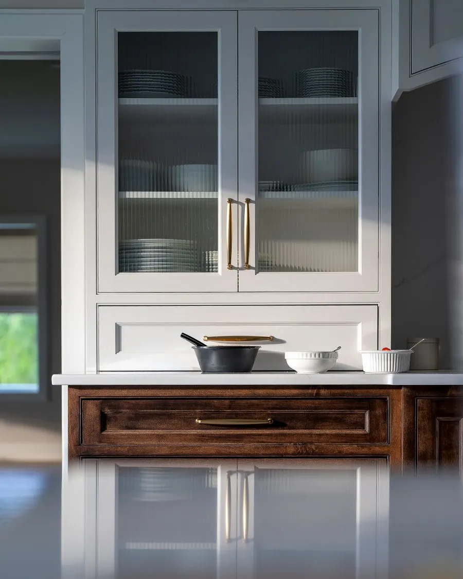 Painted cabinet doors and hardware in a frequently used kitchen