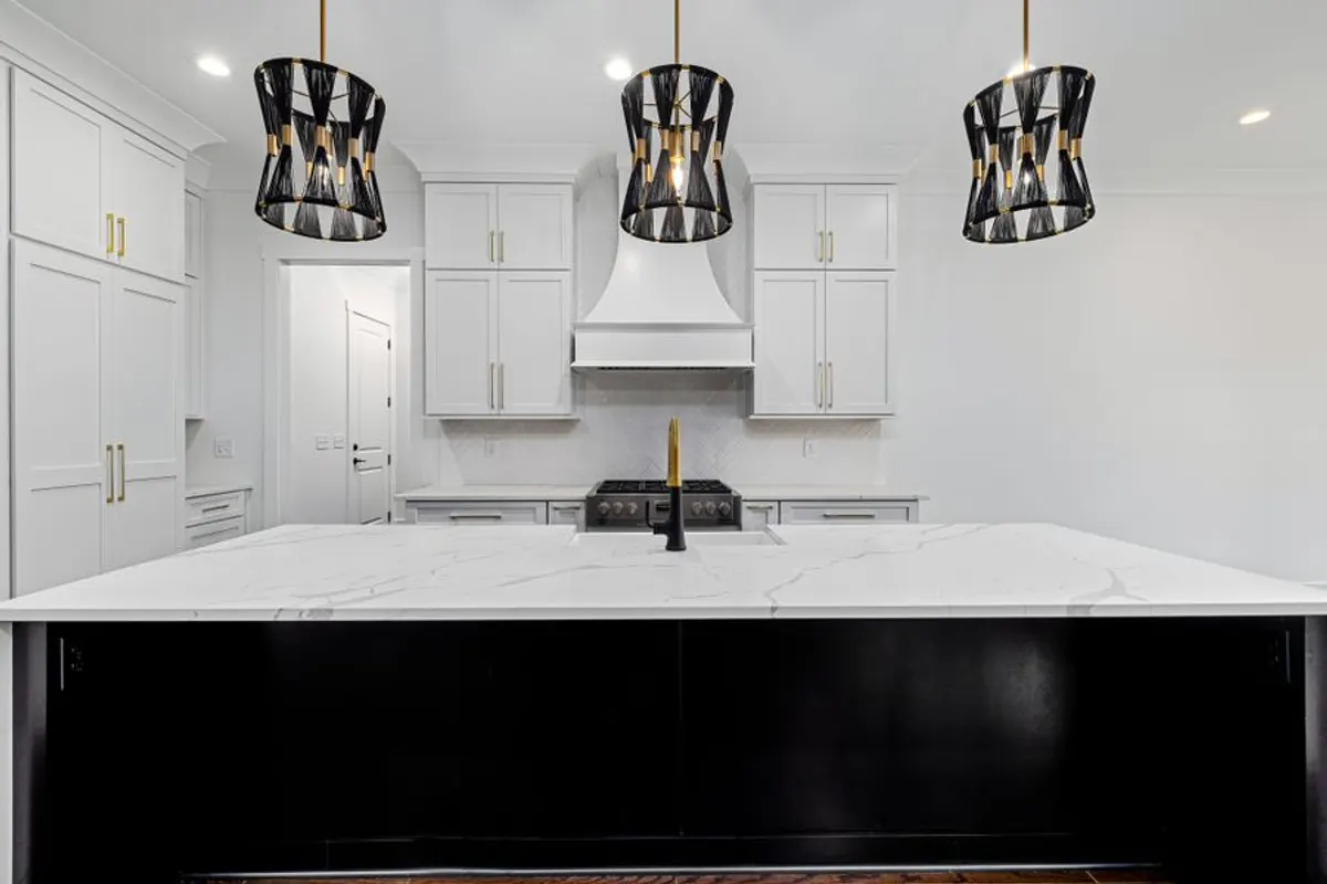 Professionally painted white kitchen cabinets with durable finish