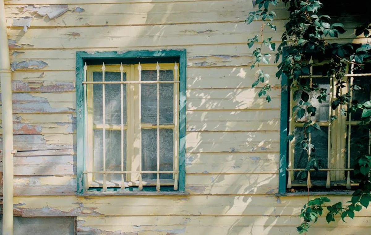 Exterior home paint prep and maintenance before repainting