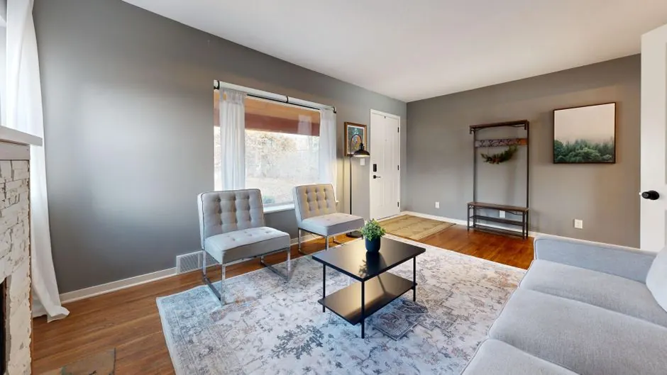 Neutral painted interior with furniture and bright walls