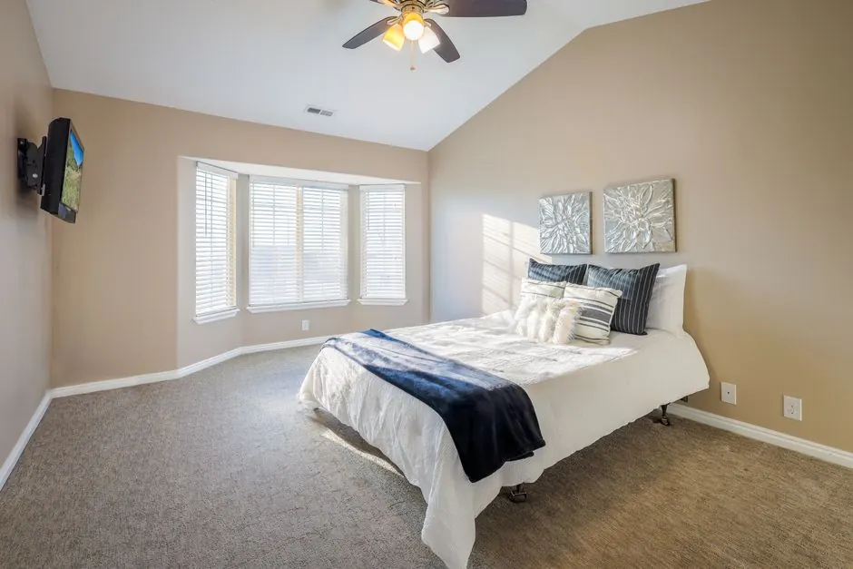 Neutral bedroom that photographs well before selling a home