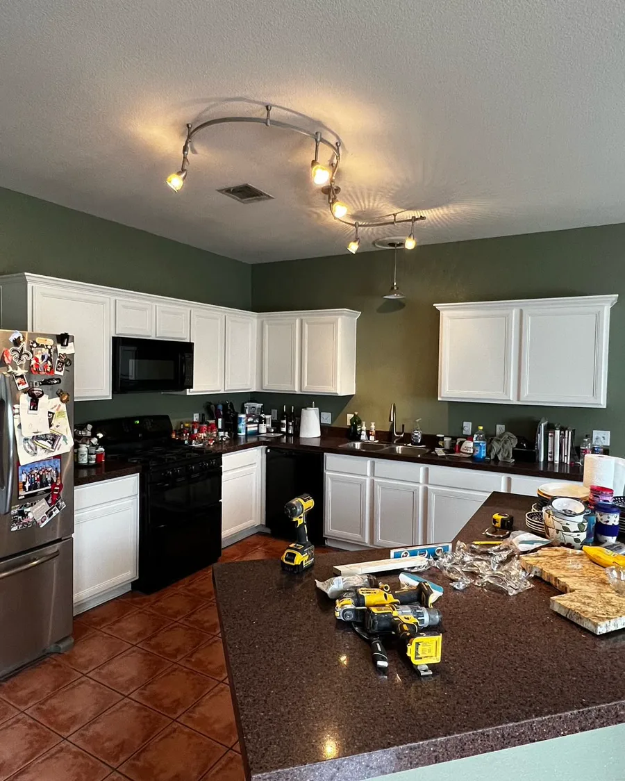 White kitchen cabinet painting project in progress by New Life Painting