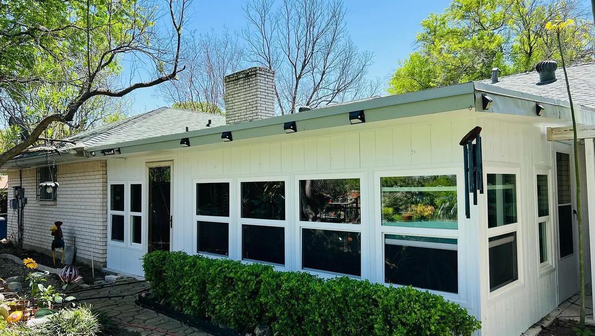 Single-story Austin-area home after a bright exterior repaint by New Life Painting