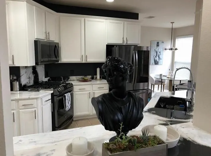 Bright finished kitchen painting project by New Life Painting in Central Texas